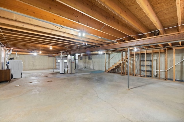 43 Coffman Ln, Plano, IL 60545 - unfinished basement featuring washer / dryer, gas water heater, stairway, and heating unit