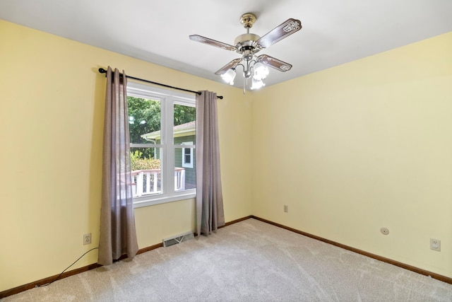43 Coffman Ln, Plano, IL 60545 - empty room featuring ceiling fan and light colored carpet