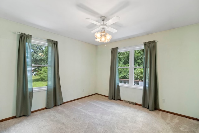 43 Coffman Ln, Plano, IL 60545 - carpeted empty room with ceiling fan and baseboards