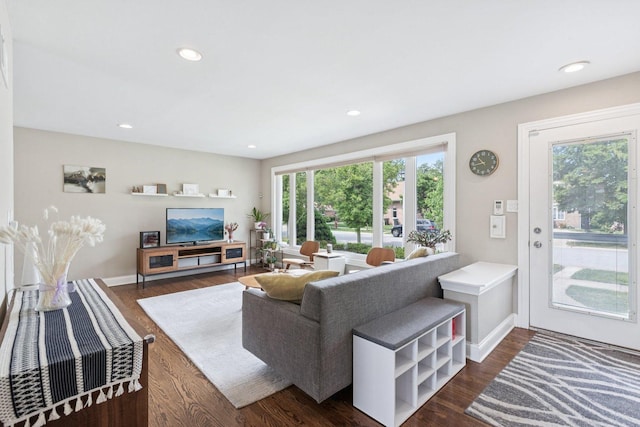 9333 Kildare Ave, Skokie, IL 60076 - living area featuring dark wood finished floors and recessed lighting