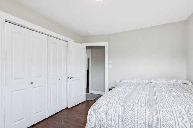 9333 Kildare Ave, Skokie, IL 60076 - bedroom featuring dark wood-type flooring and a closet