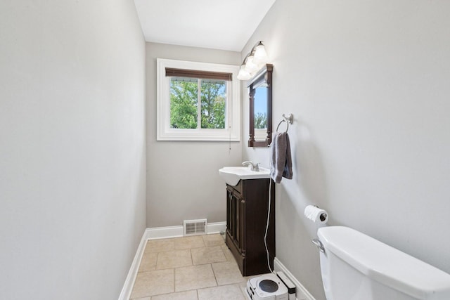 9333 Kildare Ave, Skokie, IL 60076 - half bathroom featuring vanity and tile patterned flooring