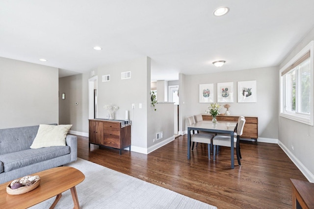 9333 Kildare Ave, Skokie, IL 60076 - living area with dark wood-style floors and recessed lighting