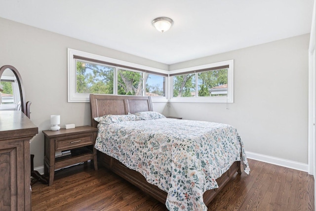 9333 Kildare Ave, Skokie, IL 60076 - bedroom featuring dark wood-style flooring and multiple windows