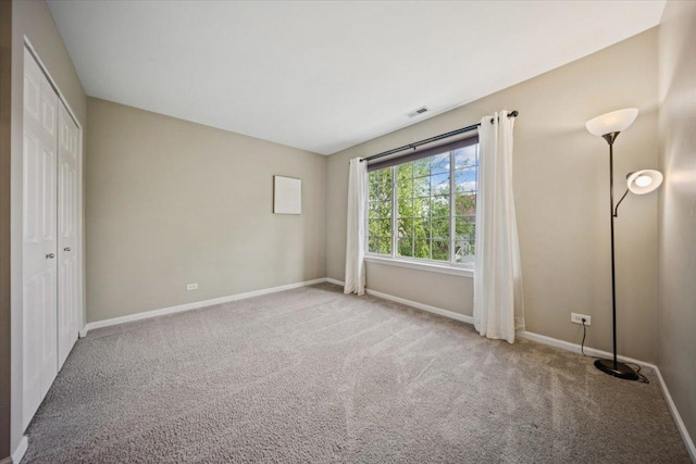 180 New Haven Dr, Cary, IL 60013 - unfurnished bedroom with carpet floors and a closet