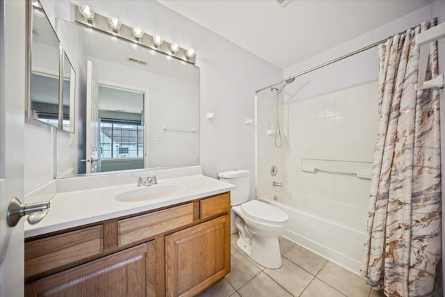 180 New Haven Dr, Cary, IL 60013 - bathroom with shower / bath combo with shower curtain, tile patterned floors, and vanity