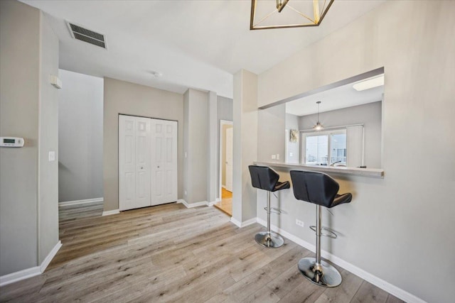 180 New Haven Dr, Cary, IL 60013 - foyer entrance featuring wood finished floors and baseboards