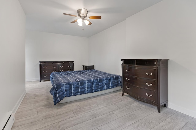 550 N Center St, South Elgin, IL 60177 - bedroom with a baseboard heating unit, light wood finished floors, and a ceiling fan