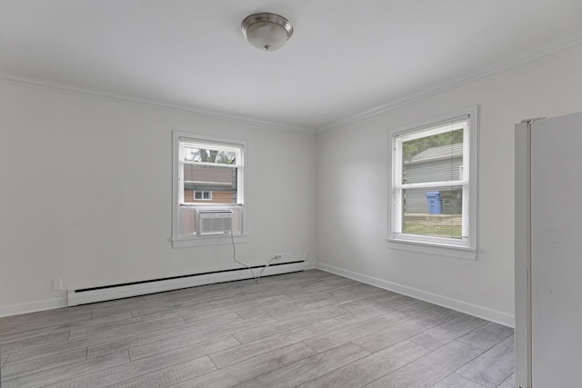 550 N Center St, South Elgin, IL 60177 - spare room with baseboard heating, ornamental molding, healthy amount of natural light, light wood finished floors, and cooling unit