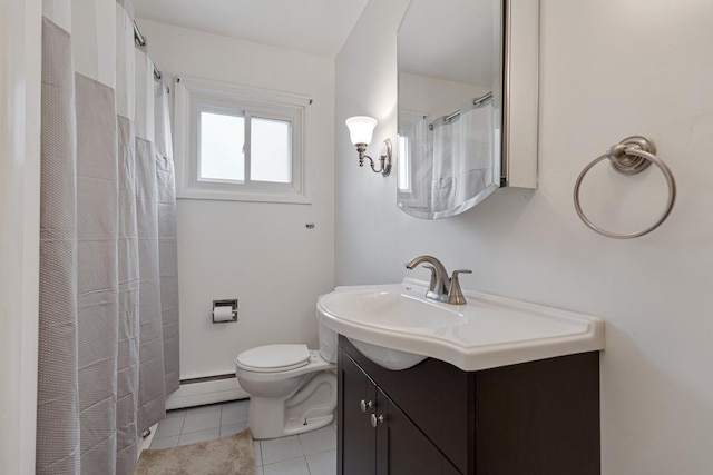 550 N Center St, South Elgin, IL 60177 - full bathroom with a baseboard radiator, vanity, and tile patterned floors