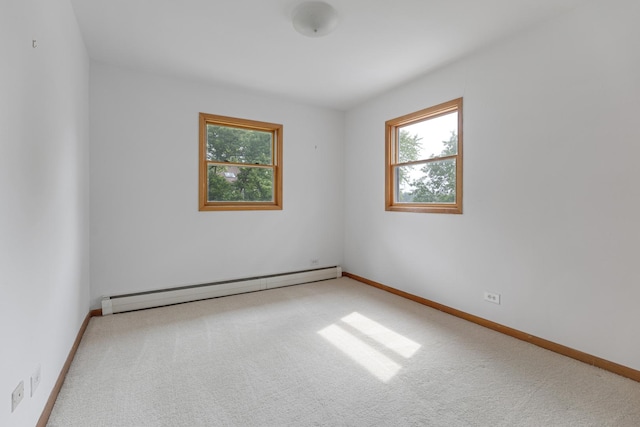 550 N Center St, South Elgin, IL 60177 - carpeted empty room with a baseboard radiator and healthy amount of natural light