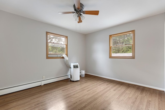 550 N Center St, South Elgin, IL 60177 - unfurnished room with light wood finished floors, baseboard heating, and a ceiling fan