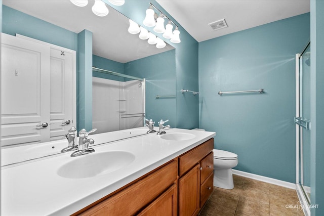 114 Devoe Dr N, Oswego, IL 60543 - bathroom featuring a stall shower, double vanity, and tile patterned flooring