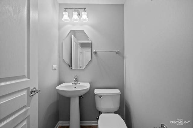 114 Devoe Dr N, Oswego, IL 60543 - half bath featuring toilet and a sink