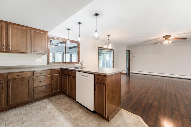 102 Mattek Ave, Dekalb, IL 60115 - kitchen with dishwasher, a peninsula, baseboard heating, ceiling fan, and open floor plan