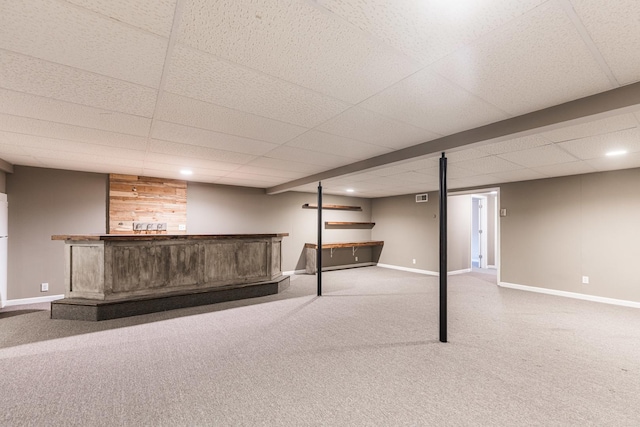 102 Mattek Ave, Dekalb, IL 60115 - finished basement featuring a bar, carpet floors, and a paneled ceiling