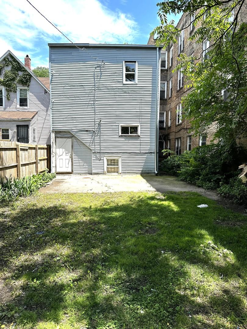 7142 S Lowe Ave, Chicago, IL 60621 - back of property with a patio