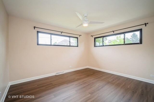 135 Flora Ave, Glenview, IL 60025 - empty room featuring wood finished floors and ceiling fan