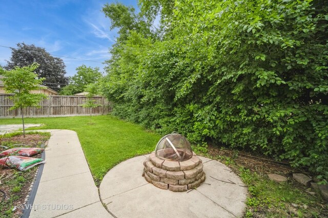 135 Flora Ave, Glenview, IL 60025 - view of yard with a fire pit
