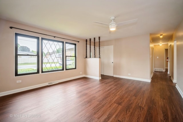 135 Flora Ave, Glenview, IL 60025 - empty room with dark wood-style flooring and ceiling fan