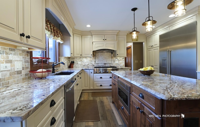 3710 Spy Glass Ridge Rd, Crystal Lake, IL 60012 - kitchen featuring built in appliances, dark wood finished floors, light stone counters, backsplash, and pendant lighting