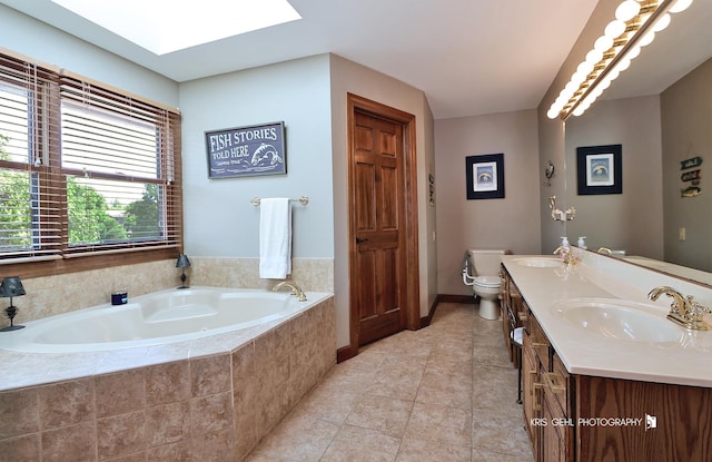 3710 Spy Glass Ridge Rd, Crystal Lake, IL 60012 - bathroom with a skylight, a bath, double vanity, and tile patterned flooring