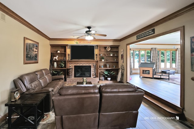 3710 Spy Glass Ridge Rd, Crystal Lake, IL 60012 - living area featuring a ceiling fan, wood finished floors, ornamental molding, and a brick fireplace