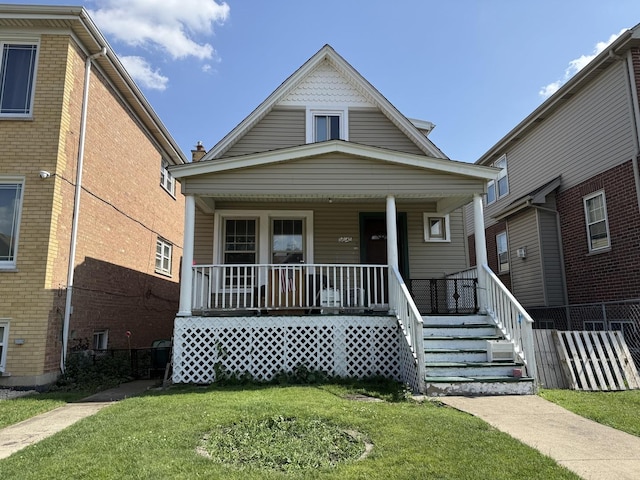 5645 W 64th St, Chicago, IL 60638 - view of front of home with a porch and a front yard