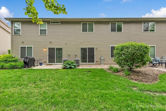 1141 Westlake Dr, Cary, IL 60013 - rear view of house featuring a patio area and a lawn