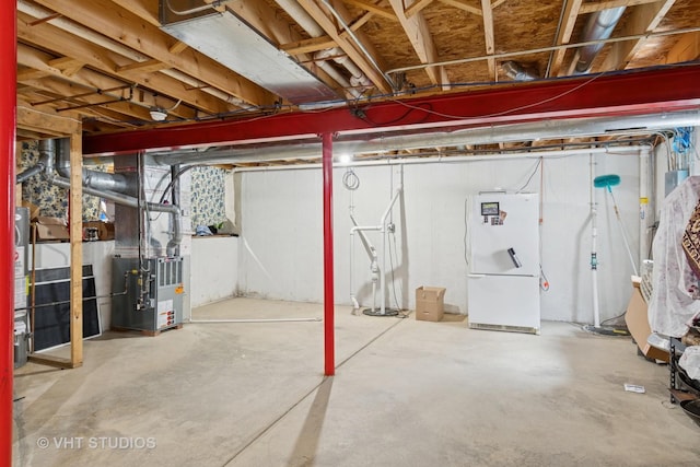 2477 Smithfield Ct, Aurora, IL 60503 - unfinished below grade area with freestanding refrigerator and heating unit
