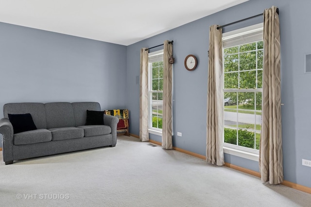 2477 Smithfield Ct, Aurora, IL 60503 - living room with carpet and baseboards