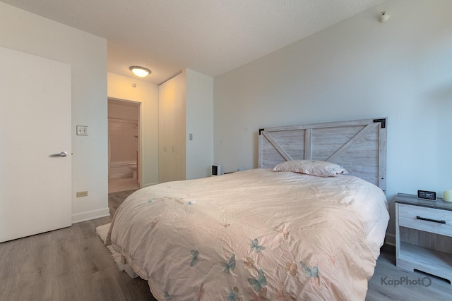 222 N Columbus Dr Unit 912, Chicago, IL 60601 - bedroom with wood finished floors and baseboards