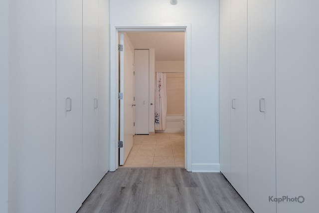 222 N Columbus Dr Unit 912, Chicago, IL 60601 - hallway featuring light wood-type flooring