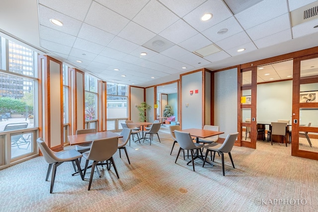 222 N Columbus Dr Unit 912, Chicago, IL 60601 - dining area with light carpet and expansive windows