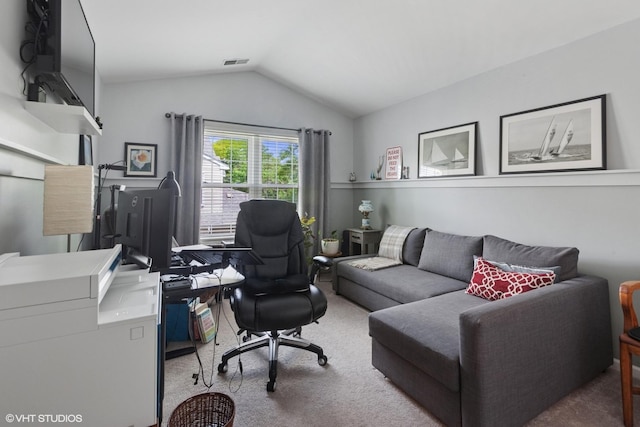 office space with carpet flooring and vaulted ceiling