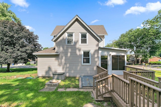 300 Stone St, South Elgin, IL 60177 - back of property featuring roof with shingles and a yard