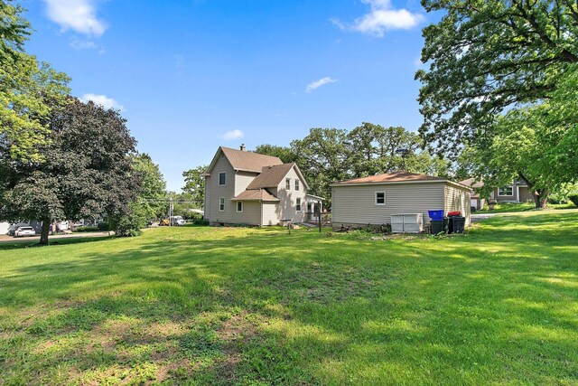 300 Stone St, South Elgin, IL 60177 - back of house featuring a lawn