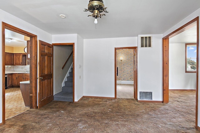 300 Stone St, South Elgin, IL 60177 - unfurnished living room featuring carpet flooring and stairs
