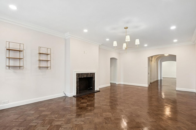 1640 E 50th St Unit 13B, Chicago, IL 60615 - unfurnished living room with arched walkways, crown molding, recessed lighting, a chandelier, and a fireplace