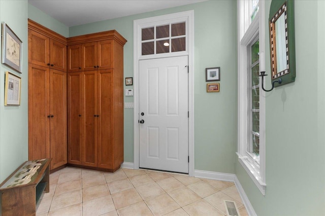 1005 Hiawatha Ln, Riverwoods, IL 60015 - entryway with light tile patterned floors and healthy amount of natural light