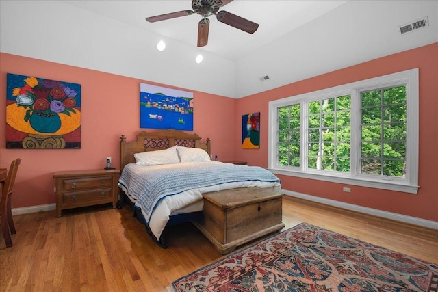 1005 Hiawatha Ln, Riverwoods, IL 60015 - bedroom with vaulted ceiling, wood finished floors, and a ceiling fan