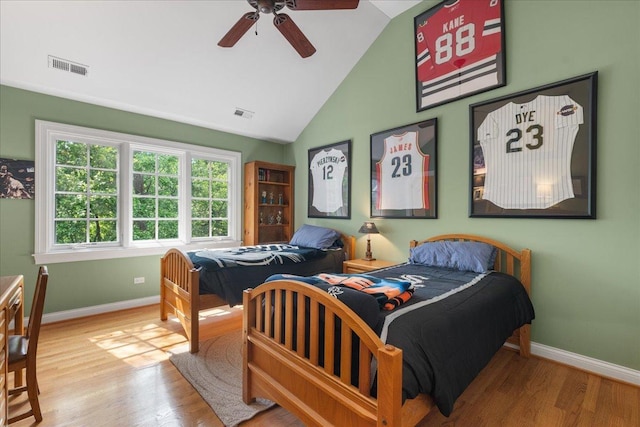 1005 Hiawatha Ln, Riverwoods, IL 60015 - bedroom with wood finished floors, vaulted ceiling, and ceiling fan