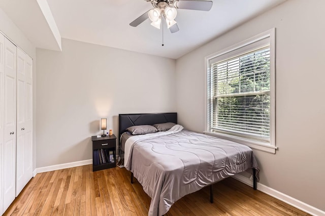7316 N Honore St Unit 306, Chicago, IL 60626 - bedroom featuring light wood finished floors, a closet, and ceiling fan