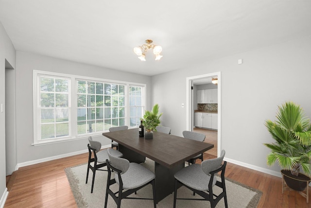 255 Irving Blvd, Chicago Heights, IL 60411 - dining area featuring a chandelier and light wood finished floors
