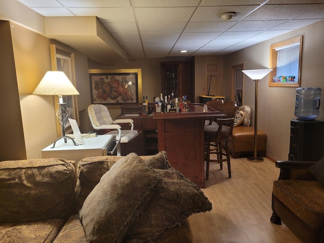 18324 Pond View Ct, Tinley Park, IL 60477 - living room with a paneled ceiling, light wood-style floors, and bar