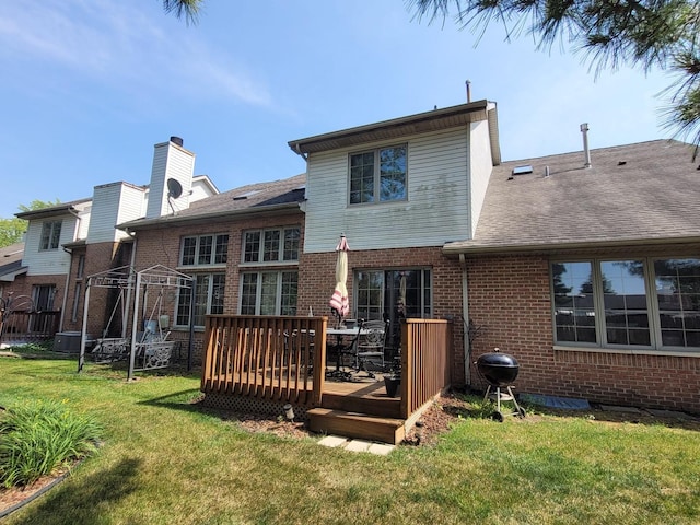 18324 Pond View Ct, Tinley Park, IL 60477 - back of house with brick siding, a yard, a deck, and roof with shingles