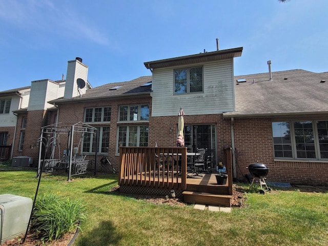 18324 Pond View Ct, Tinley Park, IL 60477 - rear view of property with brick siding, a lawn, a wooden deck, and a shingled roof