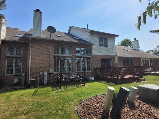 18324 Pond View Ct, Tinley Park, IL 60477 - rear view of property with brick siding, a wooden deck, a chimney, and a lawn