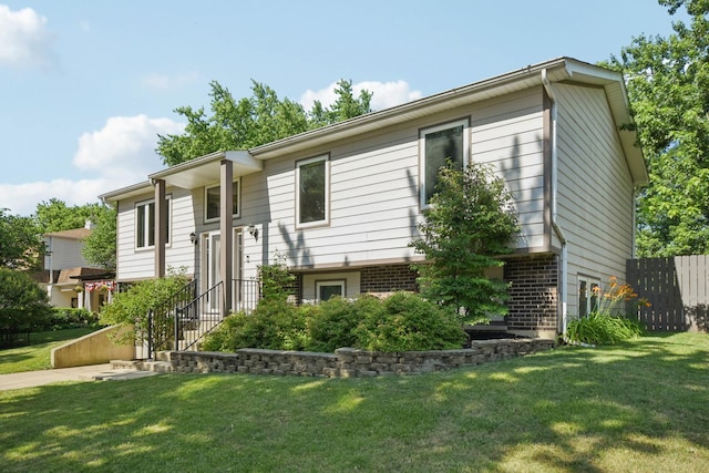 357 Sword Way, Bolingbrook, IL 60440 - raised ranch with a front lawn and brick siding