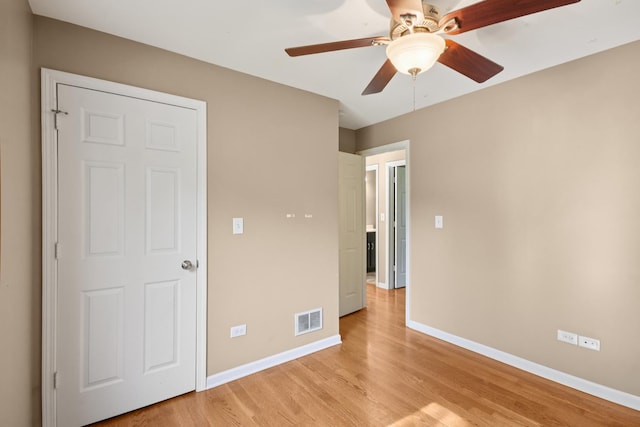 357 Sword Way, Bolingbrook, IL 60440 - unfurnished bedroom featuring light wood-style flooring and a ceiling fan